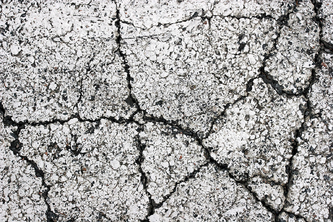 light asphalt with large cracks